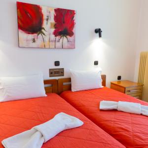 Postel nebo postele na pokoji v ubytování Hotel Pavlidis