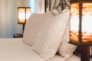 Cama ou camas em um quarto em Pousada Amanhecer
