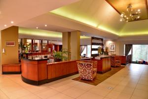 a lobby of a salon with a barber shop at City Lodge Hotel Bloemfontein in Bloemfontein