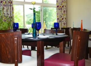 A restaurant or other place to eat at The Mulberry Inn 