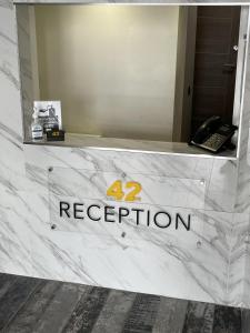a marble counter with the number registration on it at 42 Apart-Hotel in Scunthorpe