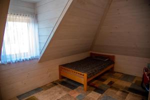 Posteľ alebo postele v izbe v ubytovaní Rezydencja w Dolinie + 37 fotografií