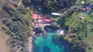 an aerial view of a house next to a river at Vistas al mar 2 Canabal in A Coruña