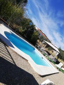 Bazén v ubytovaní Casas Rurales Los Montes alebo v jeho blízkosti