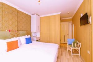 Кровать или кровати в номере Walnut Shell Hotel Sultanahmet