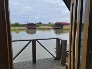 a view of the water from a window of a boat at Lakeside Fishing Pods in Boston