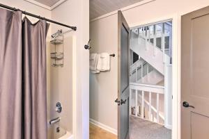 a bathroom with a shower and a staircase at Highlands Home with Fireplace, Views, and Trails! in Highlands +19 photos