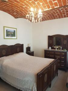 Tempat tidur dalam kamar di Azienda Agricola Cascina Monticone