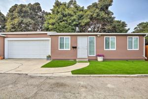 a house with a driveway and a garage at Updated Chula Vista Townhome - WFH Friendly! in Chula Vista