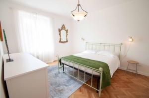 A bed or beds in a room at Casa Sass