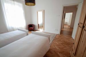 A bed or beds in a room at Casa Sass