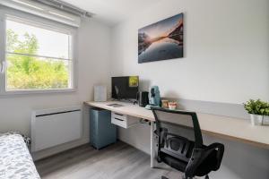 Μια τηλεόραση ή/και κέντρο ψυχαγωγίας στο Studio Tranquille et COSY Fonderie +1 φωτογραφίες