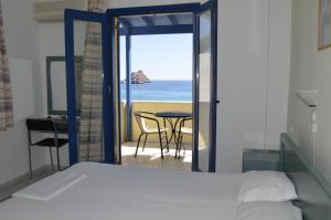Posteľ alebo postele v izbe v ubytovaní Akti Rooms