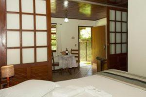 Cama ou camas em um quarto em Pousada Caminho das Candeias