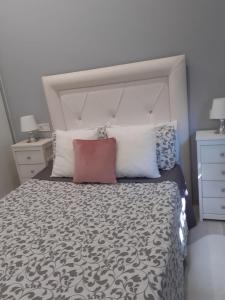 Posteľ alebo postele v izbe v ubytovaní Apartamento Casa Lozano
