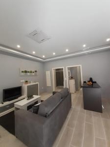 Televízia a/alebo spoločenská miestnosť v ubytovaní Apartamento Casa Lozano