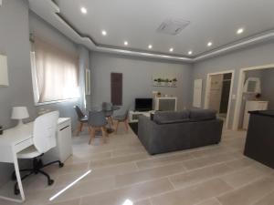 Televízia a/alebo spoločenská miestnosť v ubytovaní Apartamento Casa Lozano