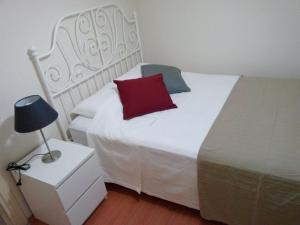 A bed or beds in a room at Konakli Apartments Izmir