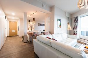 Ένα ή περισσότερα κρεβάτια σε δωμάτιο στο Nordica Design Residence Rovaniemi