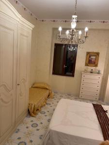 Łóżko lub łóżka w pokoju w obiekcie Al Centro Storico Home