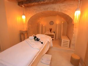 Postel nebo postele na pokoji v ubytování Casa Diluca Cartagena Hotel Boutique