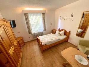 Postel nebo postele na pokoji v ubytování Hotel Charlott