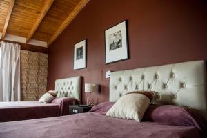 Ένα ή περισσότερα κρεβάτια σε δωμάτιο στο Casa Soñada reserva natural piletas & vistas Carlos Paz +39 φωτογραφίες