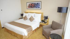 Postel nebo postele na pokoji v ubytování Tenera Hotel