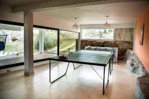 Πινγκ πονγκ στο Casa Soñada reserva natural piletas & vistas Carlos Paz ή εκεί κοντά