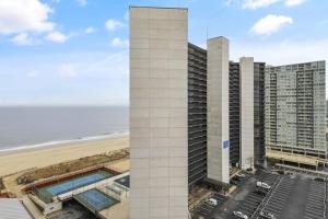 an aerial view of a building next to the beach at Capri II in Ocean City