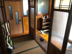 an open door in a room with a room with a room at Cafe Restaurant Umi no Yado Awaji Island - Vacation STAY 61253v in Awaji