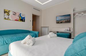 Postel nebo postele na pokoji v ubytování Tiffany Suites