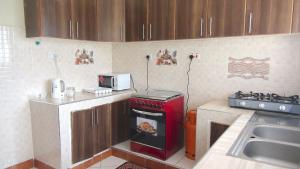 Kuchyň nebo kuchyňský kout v ubytování AVISHAI HOMES