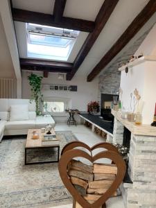 a living room with a heart shaped table in the middle at Addicted to Paradise b&b in Trieste