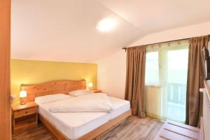 Ένα ή περισσότερα κρεβάτια σε δωμάτιο στο Texel Apartments