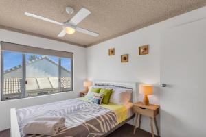 A bed or beds in a room at Wintersview 2 - Lennox Head