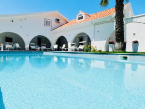 Bazén v ubytování Villa le Agavi - exclusive holiday end event nebo v jeho okolí