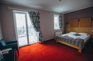 Postel nebo postele na pokoji v ubytování Hoch Land