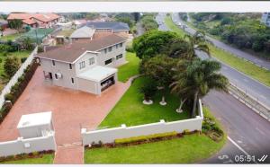 an aerial view of a house with a yard at Precious Paradise Villa in Amanzimtoti