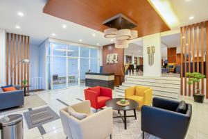 Posezení v ubytování Sans Hotel Prime Cailendra Yogyakarta by RedDoorz