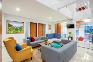 Posezení v ubytování Sans Hotel Prime Cailendra Yogyakarta by RedDoorz