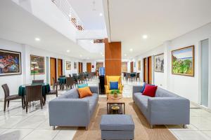 Posezení v ubytování Sans Hotel Prime Cailendra Yogyakarta by RedDoorz