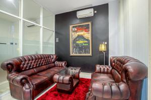 Posezení v ubytování Sans Hotel Prime Cailendra Yogyakarta by RedDoorz