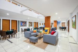 Posezení v ubytování Sans Hotel Prime Cailendra Yogyakarta by RedDoorz