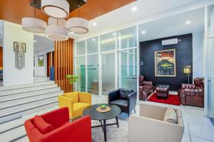 Posezení v ubytování Sans Hotel Prime Cailendra Yogyakarta by RedDoorz