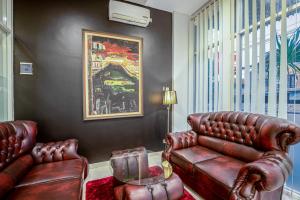 Posezení v ubytování Sans Hotel Prime Cailendra Yogyakarta by RedDoorz