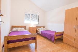 Postel nebo postele na pokoji v ubytování Apartman Marica with swimmingpool + 21 fotografií