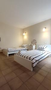 Llit o llits en una habitació de Apartamentos Turísticos ENCANTO