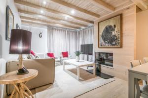 A television and/or entertainment centre at Dossau By Totiaran