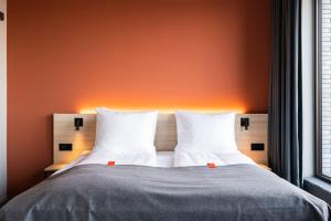 Postel nebo postele na pokoji v ubytování Citybox Antwerp